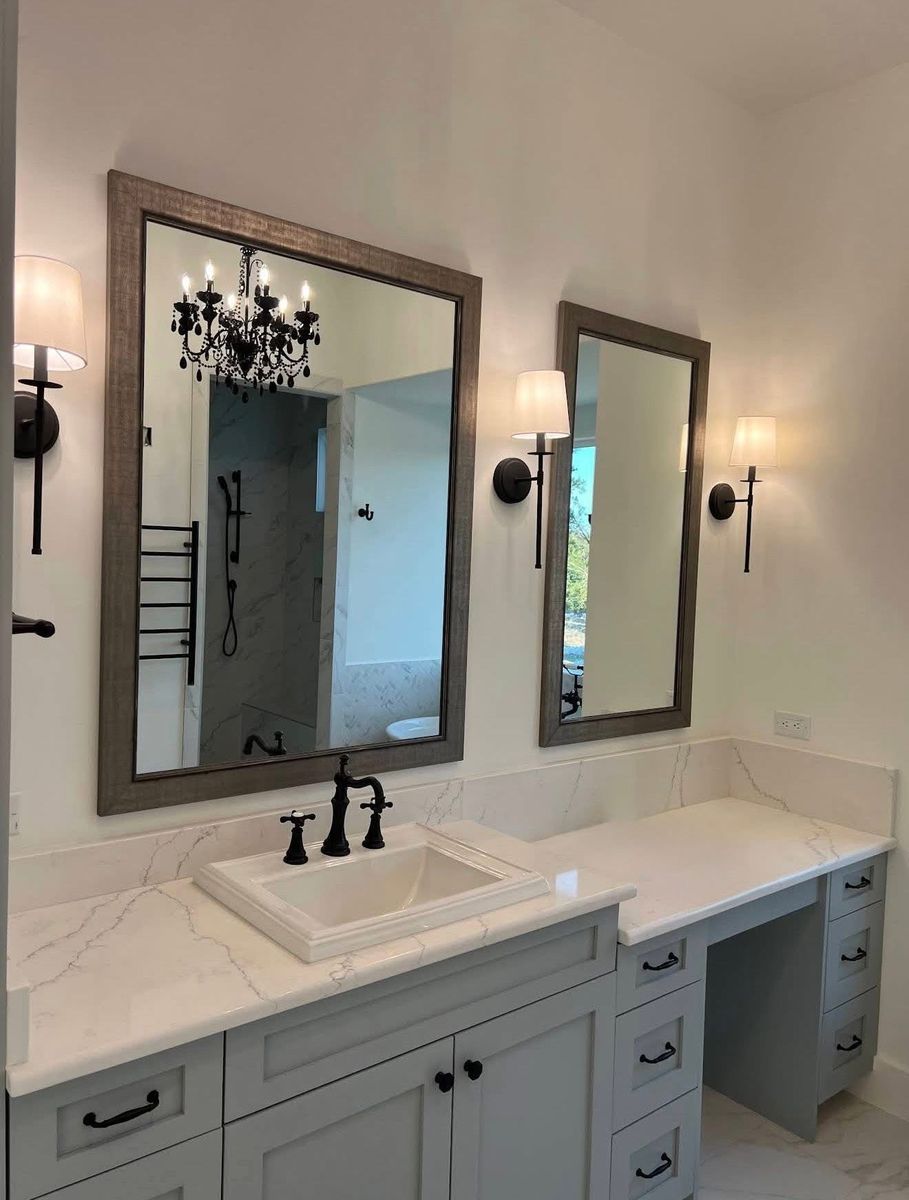 Gray shaker bathroom vanity with quartz top, makeup desk, framed mirrors and black sconces, San Antonio bathroom remodel